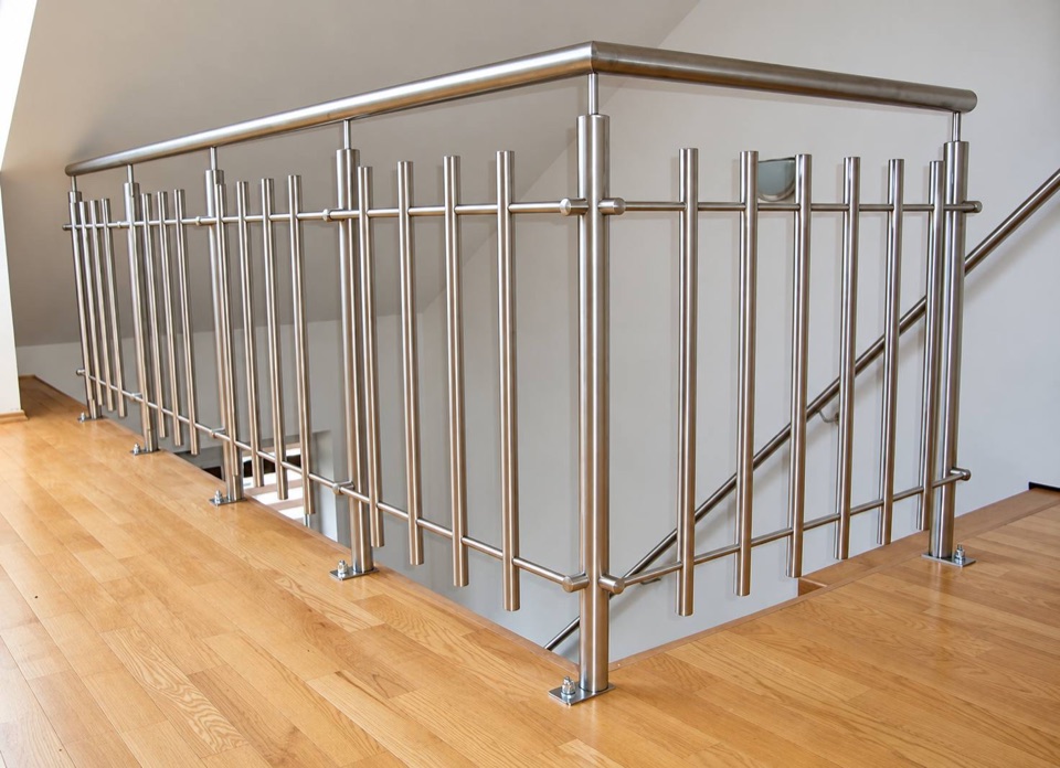 Stainless steel railing around a stairwell